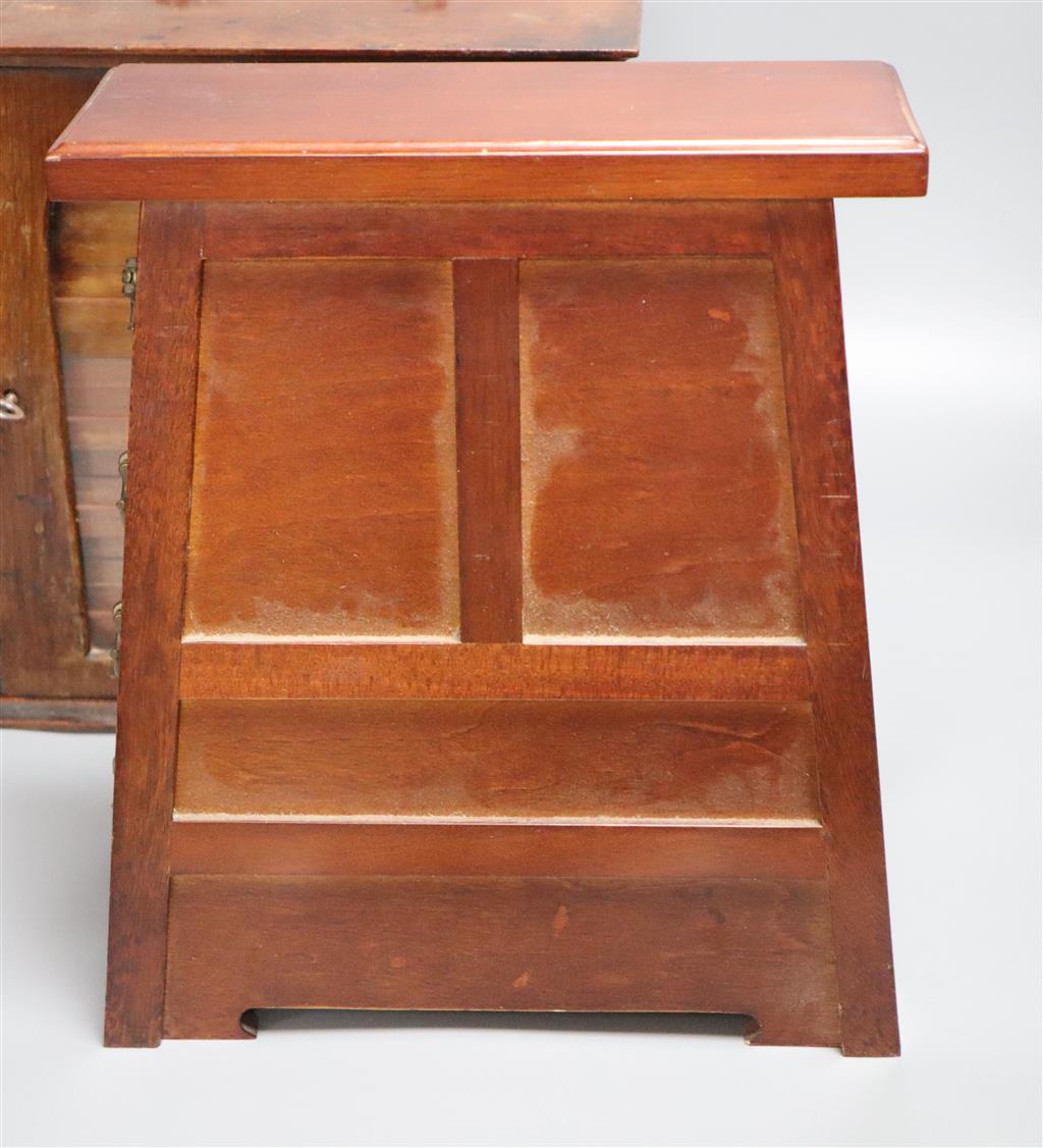 A Victorian mahogany coin collectors cabinet, 27cm wide, and a mahogany table top bank of four drawers